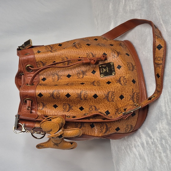 MCM Cognac Leather Drawstring Shoulder Crossbody Bucket Bag with Charm - Picture 4 of 17